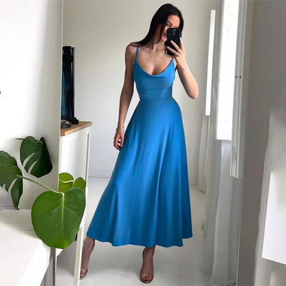 Women's Sleeveless Maxi Dress with Deep V-Neck and Flowing Skirt