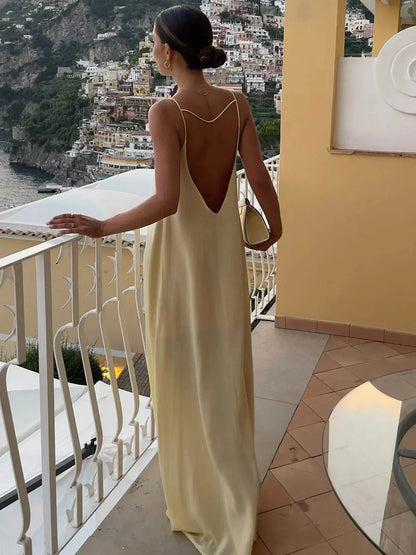 Women's Yellow Backless Maxi Dress with Sleek Straps and Open Back